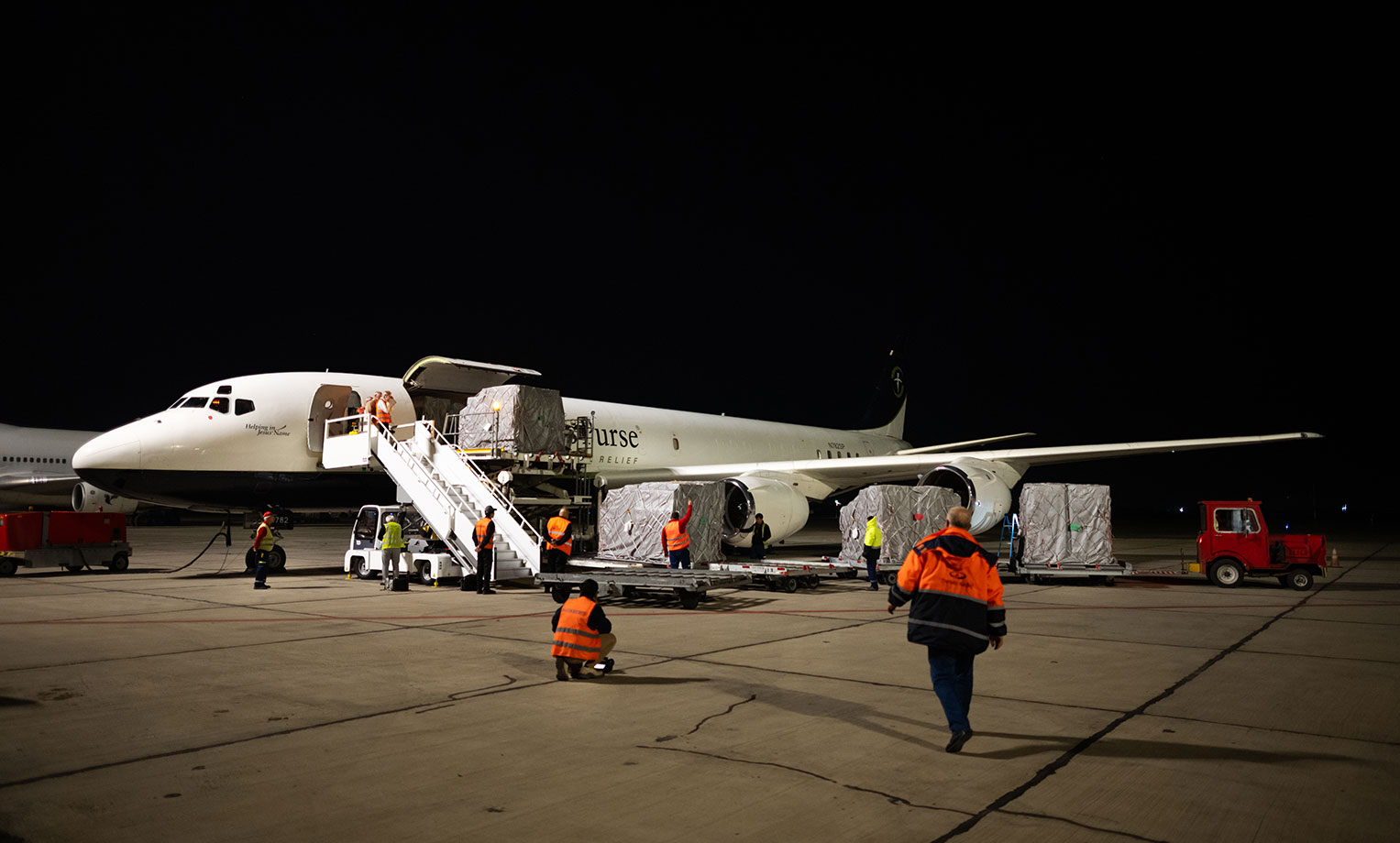 The DC-8 unloads aid in Yerevan, Armenia.