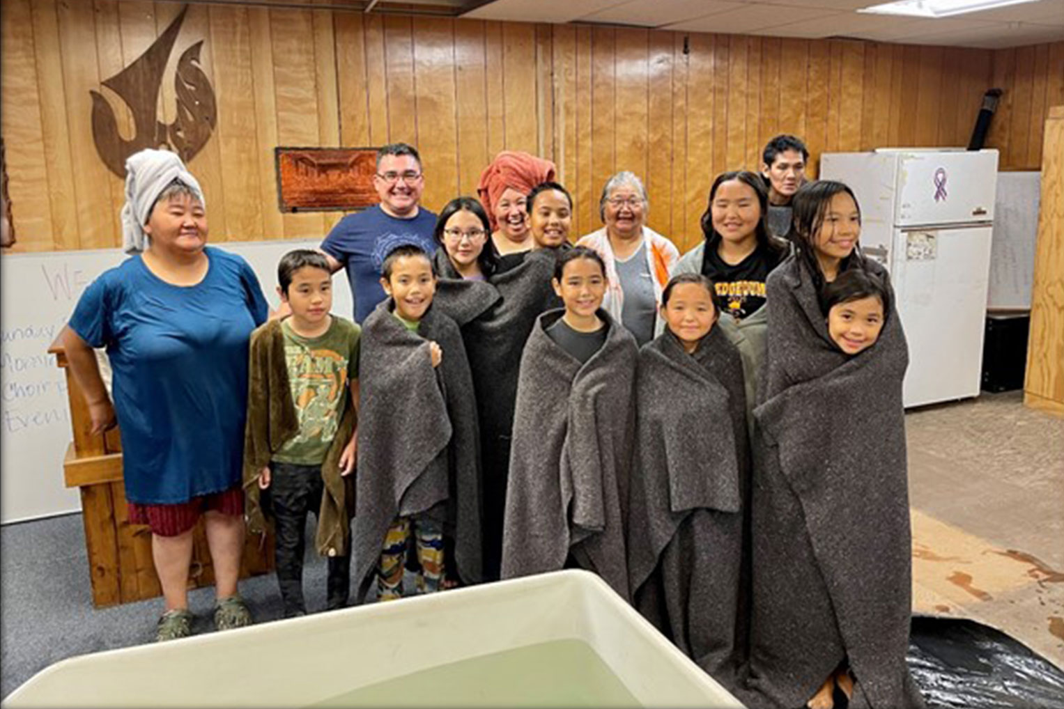 A number of children and adults were baptized over the summer.