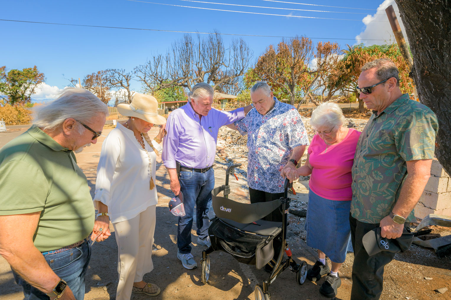 Samaritan's Purse President Franklin Graham prayed with local church leaders and residents during his visit days after the blaze.