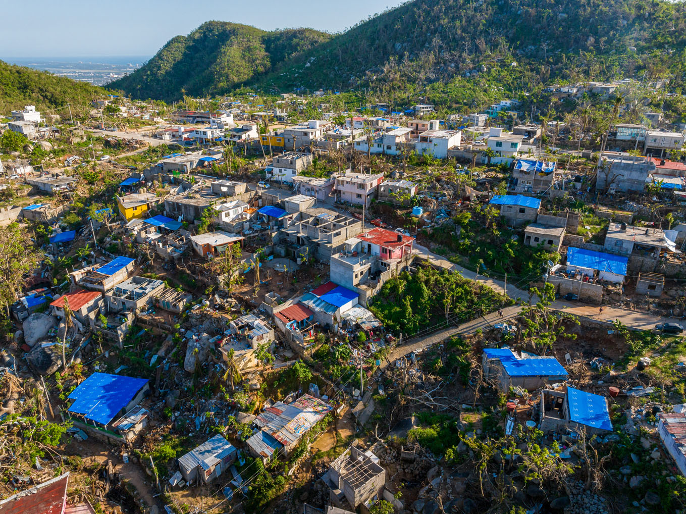 Volunteers helped tarp nearly 100 damaged roofs in the mountain communities surrounding Acapulco.