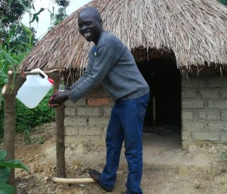 The latrine and handwashing station will protect Simeon's family from illness and keep the village groundwater safe from contaminants.