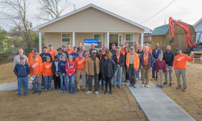 Our rebuild team celebrated Lewis Sharpe's new home provided by Samaritan's Purse.