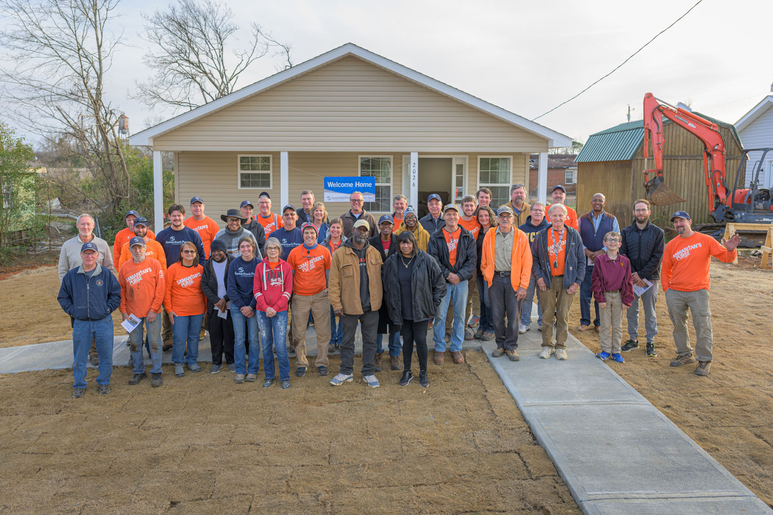 Our rebuild team celebrated Lewis Sharpe's new home provided by Samaritan's Purse.
