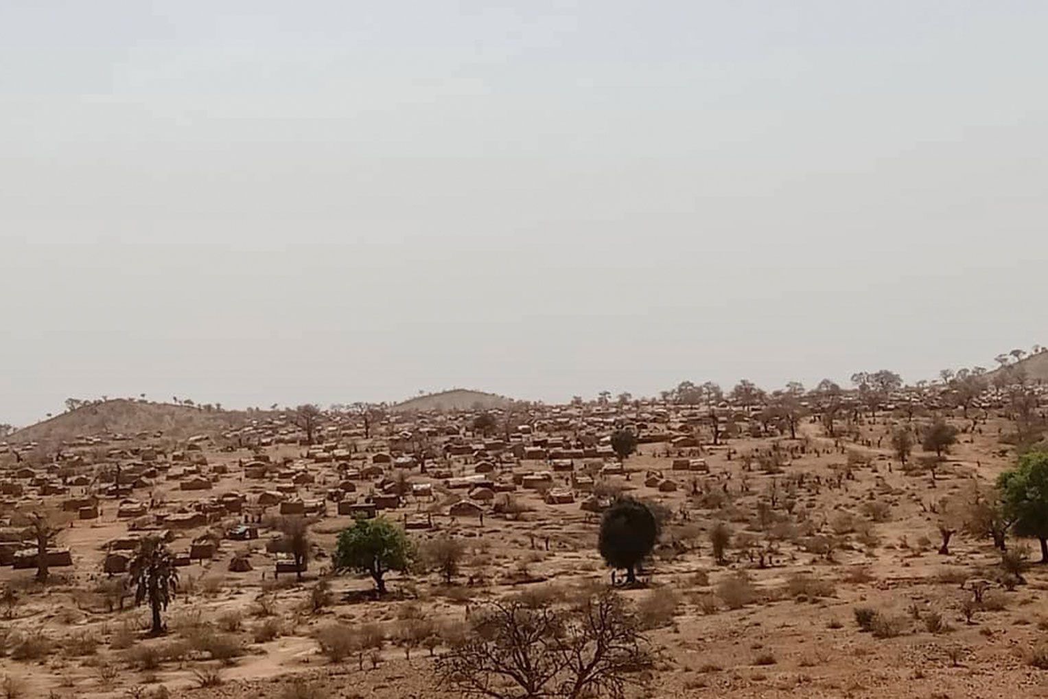 Families in South Kordofan are living in handmade dwelling scattered across the arid land.