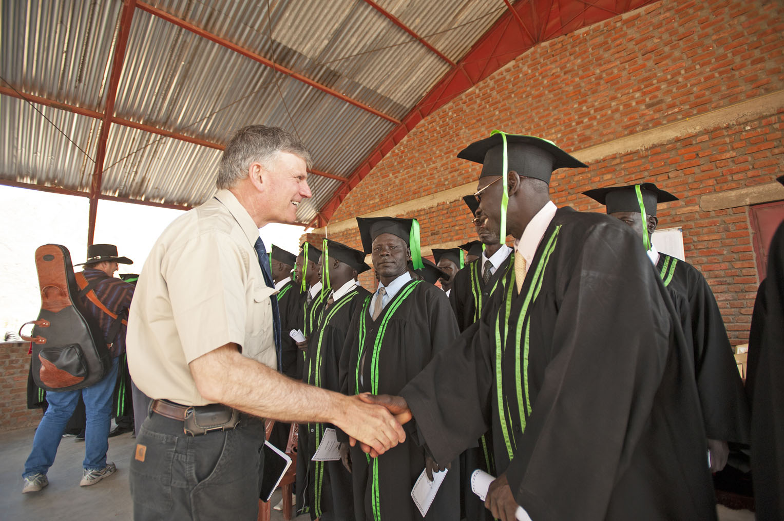 Samaritan's Purse President Franklin Graham visited with students during the school's first graduation.