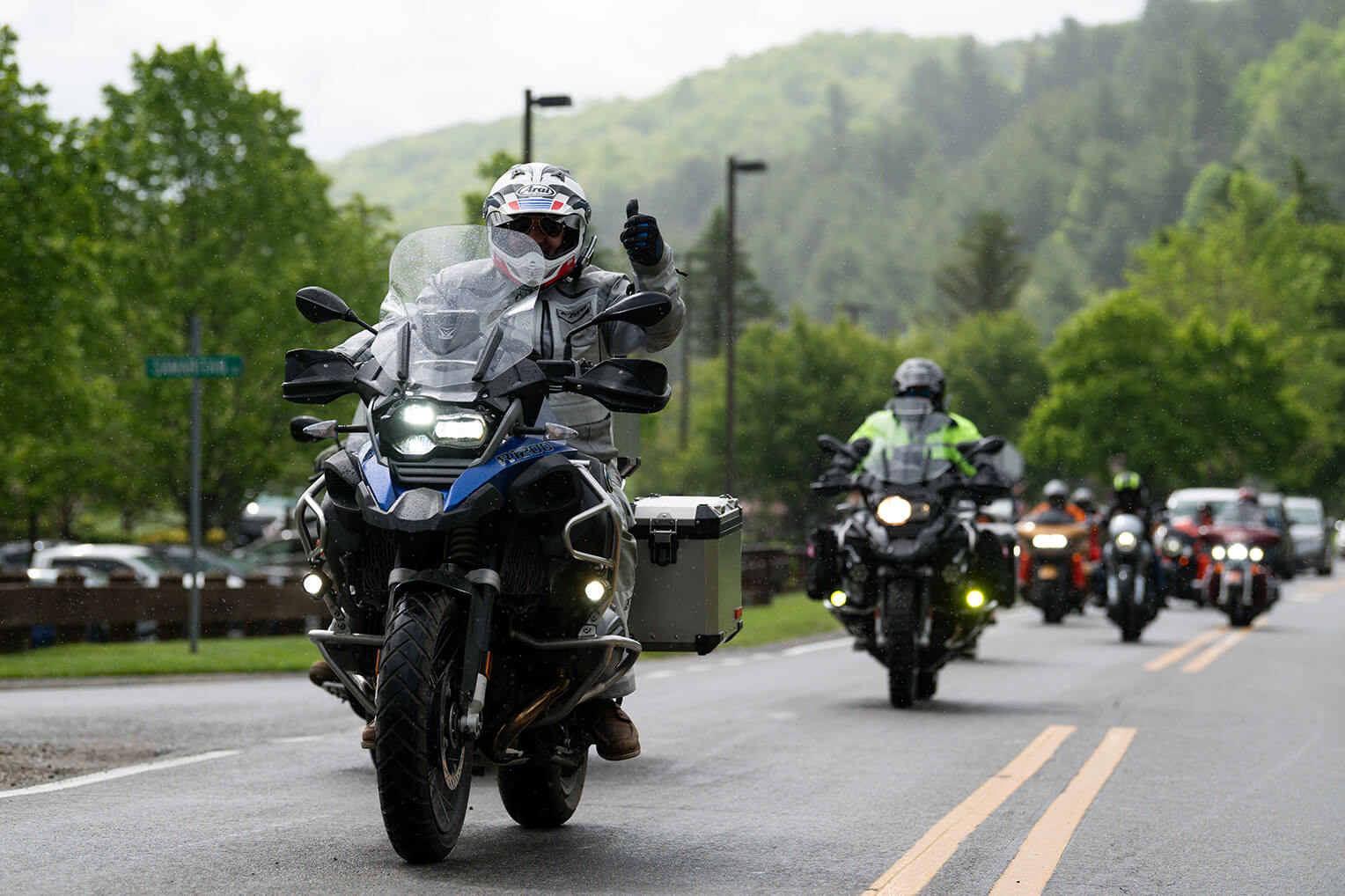 A rider gave a thumbs-up as the convoy left the International Headquarters for Samaritan's Purse in Boone, North Carolina.
