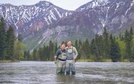 A wounded veteran and his spouse enjoy the scenery at a popular fishing spot in Lake Clark National Park's Kijik River. Operation Heal Our Patriots.