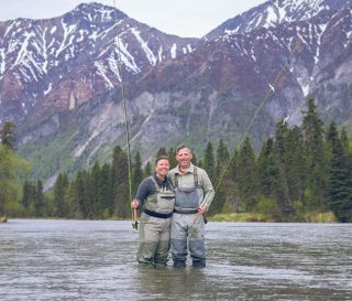 A wounded veteran and his spouse enjoy the scenery at a popular fishing spot in Lake Clark National Park's Kijik River. Operation Heal Our Patriots.