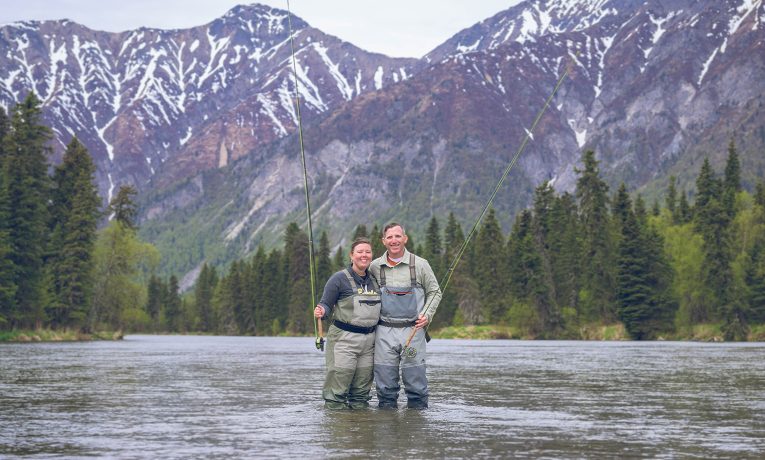 A wounded veteran and his spouse enjoy the scenery at a popular fishing spot in Lake Clark National Park's Kijik River. Operation Heal Our Patriots.