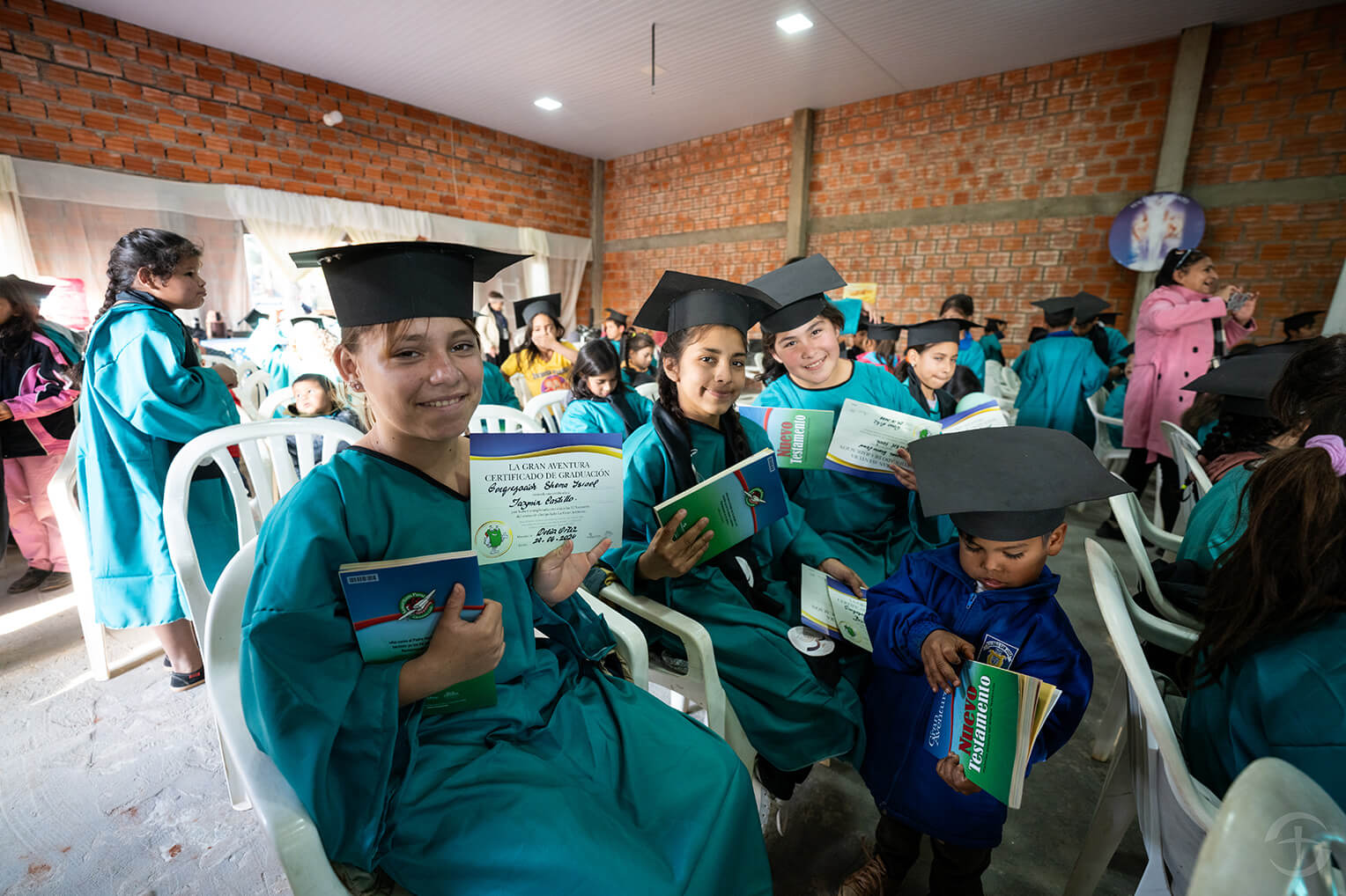 After the 12-week course, participants in The Greatest Journey attend a graduation where they receive a certificate and a copy of the New Testament in their native language.