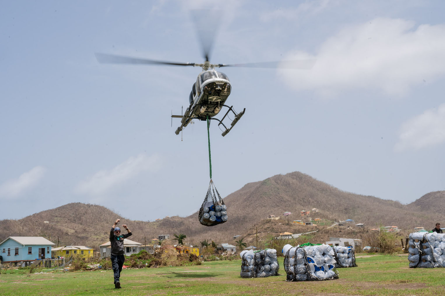 Samaritan's Purse is sling loading supplies from our helicopter to remote locations in the Caribbean.