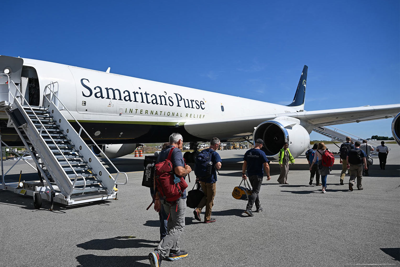 Samaritan's Purse Disaster Assistance Response Team (DART) members boarded our DC-8 this morning en route to Grenada.