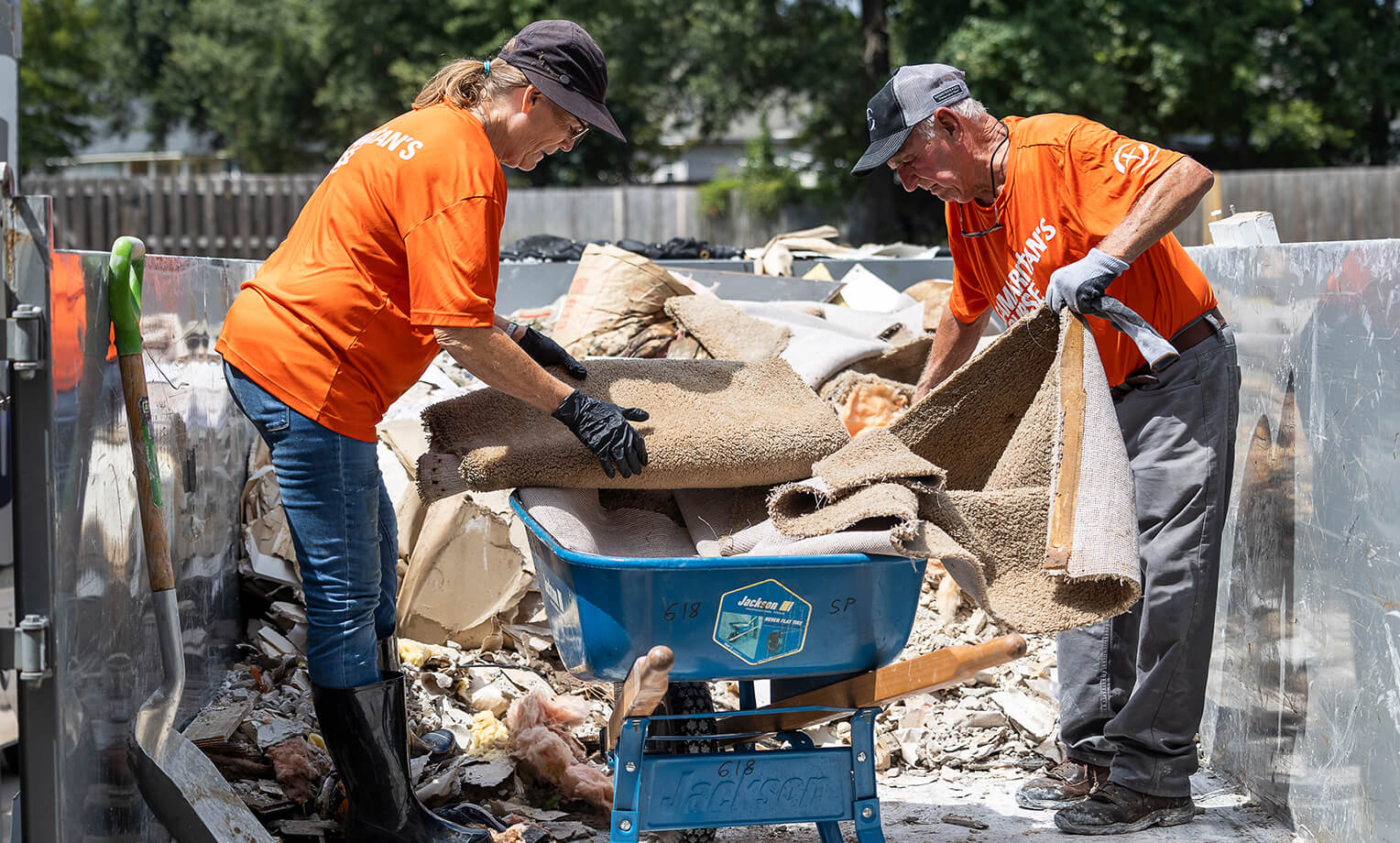 Volunteers have started work in Georgia, mudding-out flooded homes and removing strewn debris.