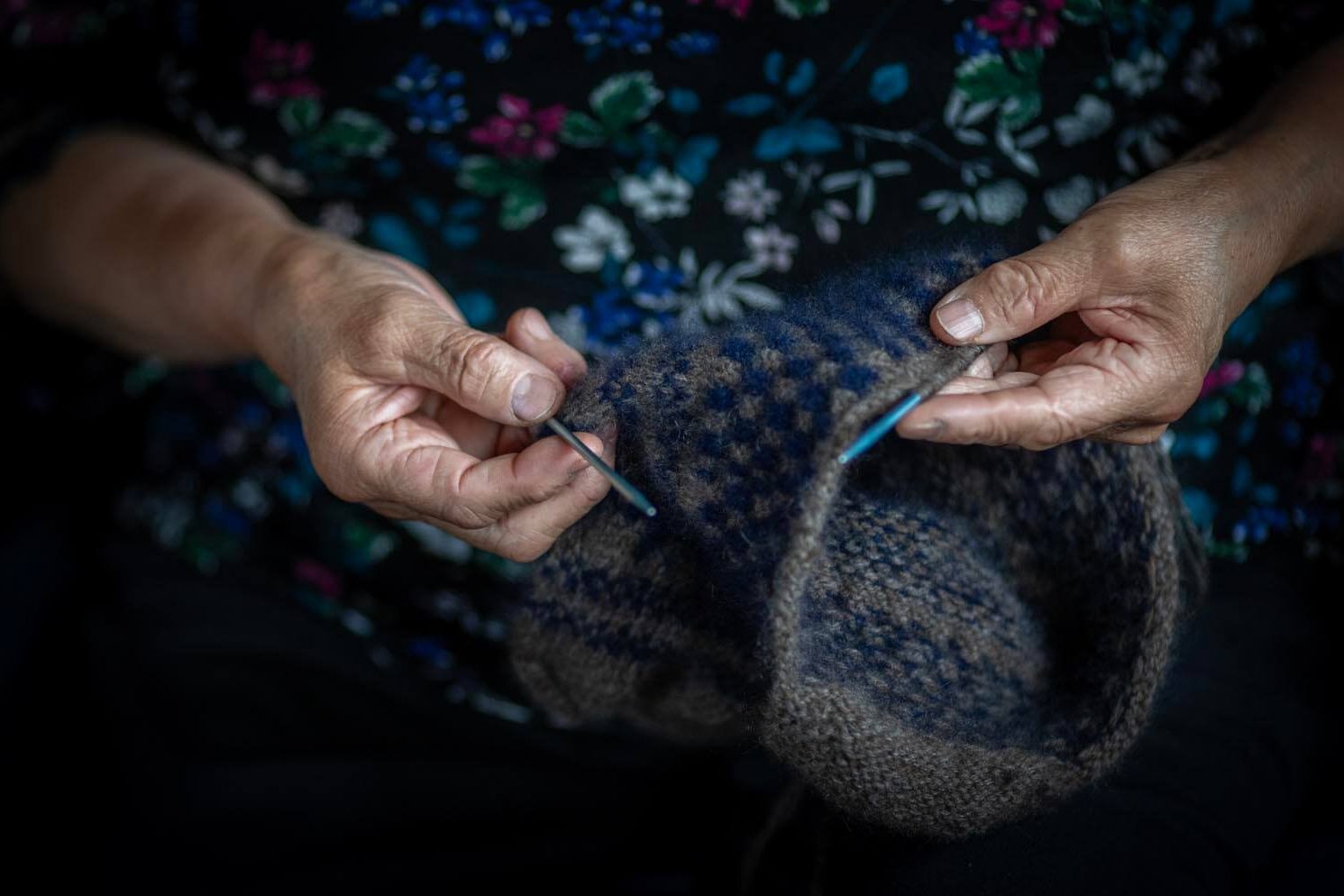 Lydia Weston knits a qiviut cap, which is among the softest and warmest of wools.