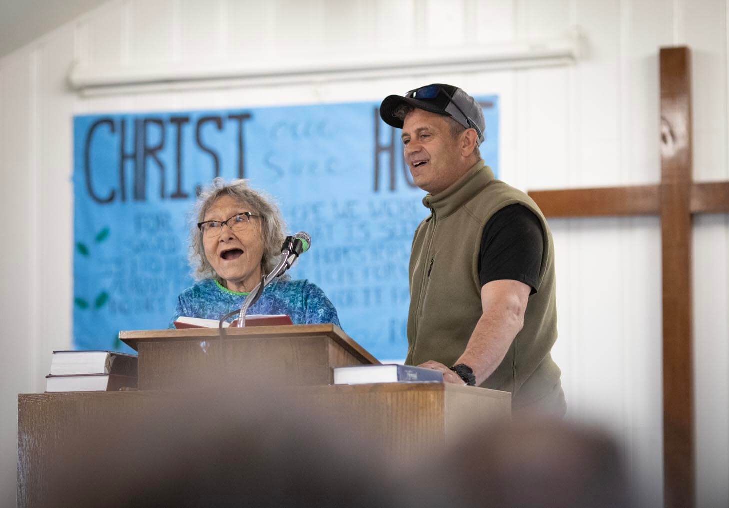 Prudy Olrun and Russ Richardson sing "I'll Fly Away" at a church service this summer.