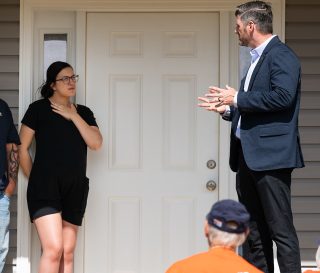 Samaritan's Purse COO Edward Graham welcomes a family to their new home.