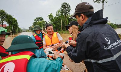 Samaritan’s Purse staff distributes lifejackets, flashlights, and whistles to residents in the Yen Bai province of Vietnam just days after Typhoon Yagi made landfall.