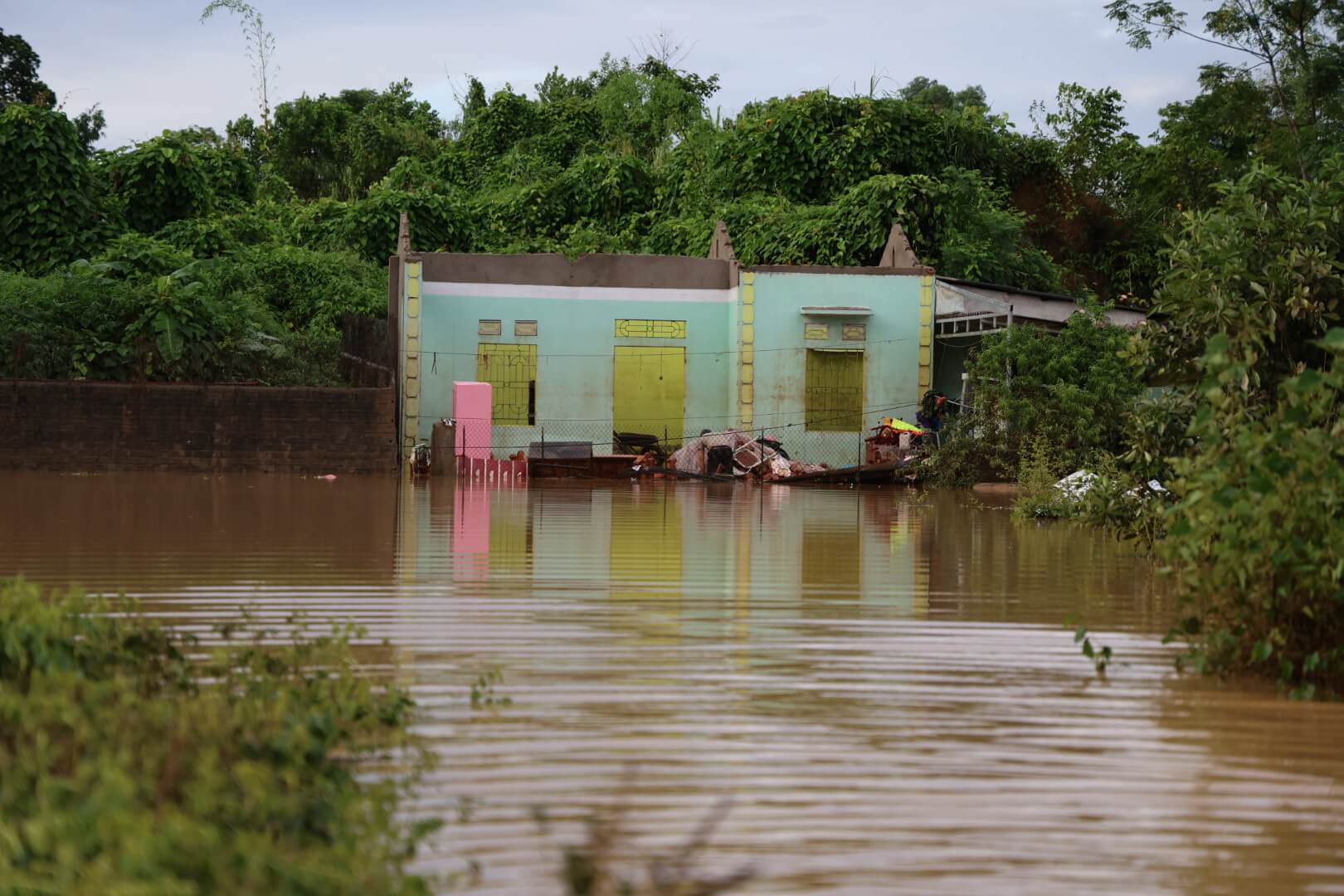 Entire neighborhoods are still flooded in Yagi's wake. Homes and businesses throughout Vietnam are severely damaged or destroyed. 