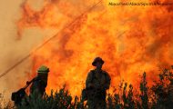 Firefighters battle to contain the Park Fire in California on July 25, 2024.