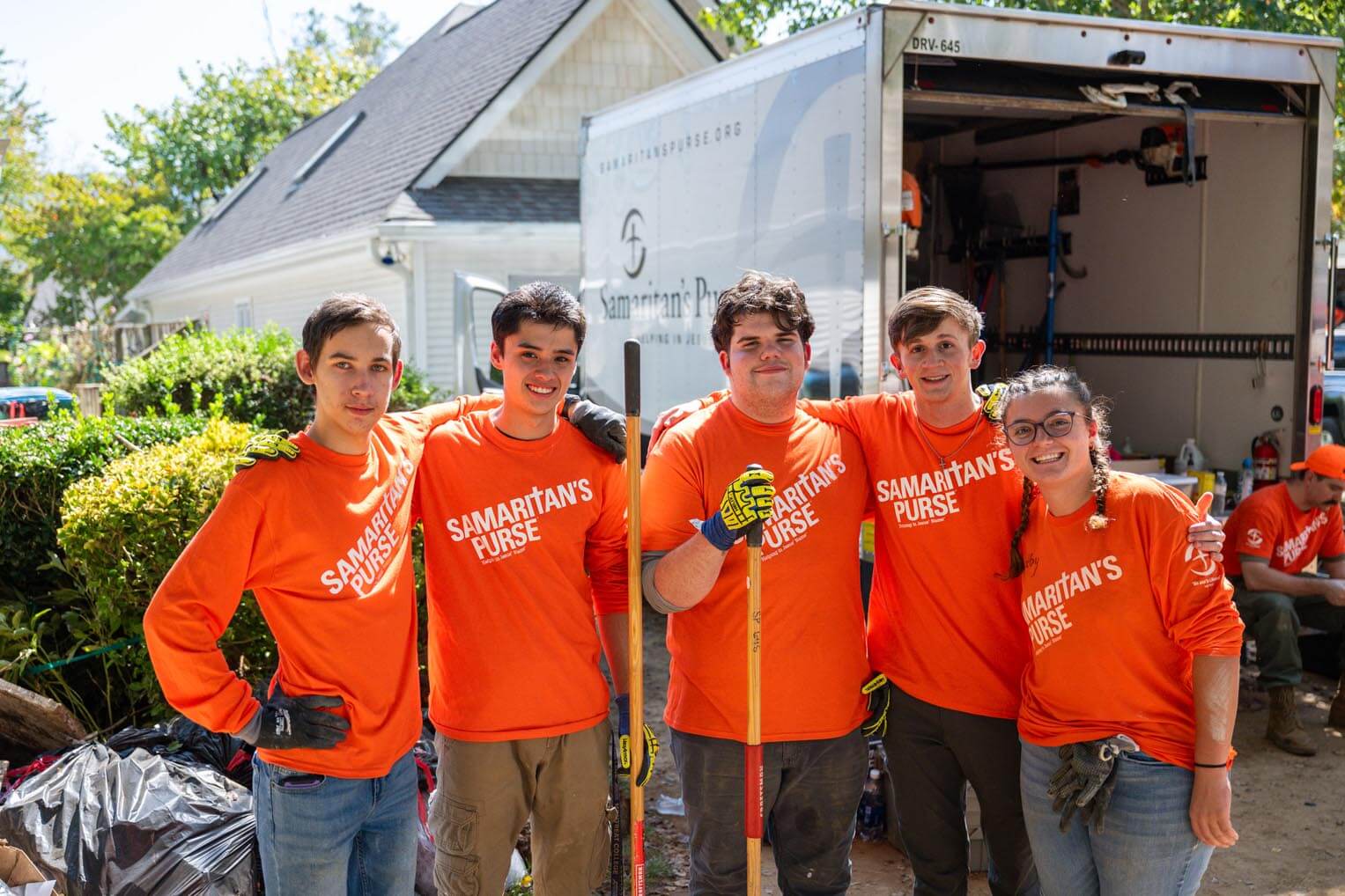 Andrii, at far left, had to flee Ukraine. He was among several Montreat College students who volunteered with Samaritan's Purse.