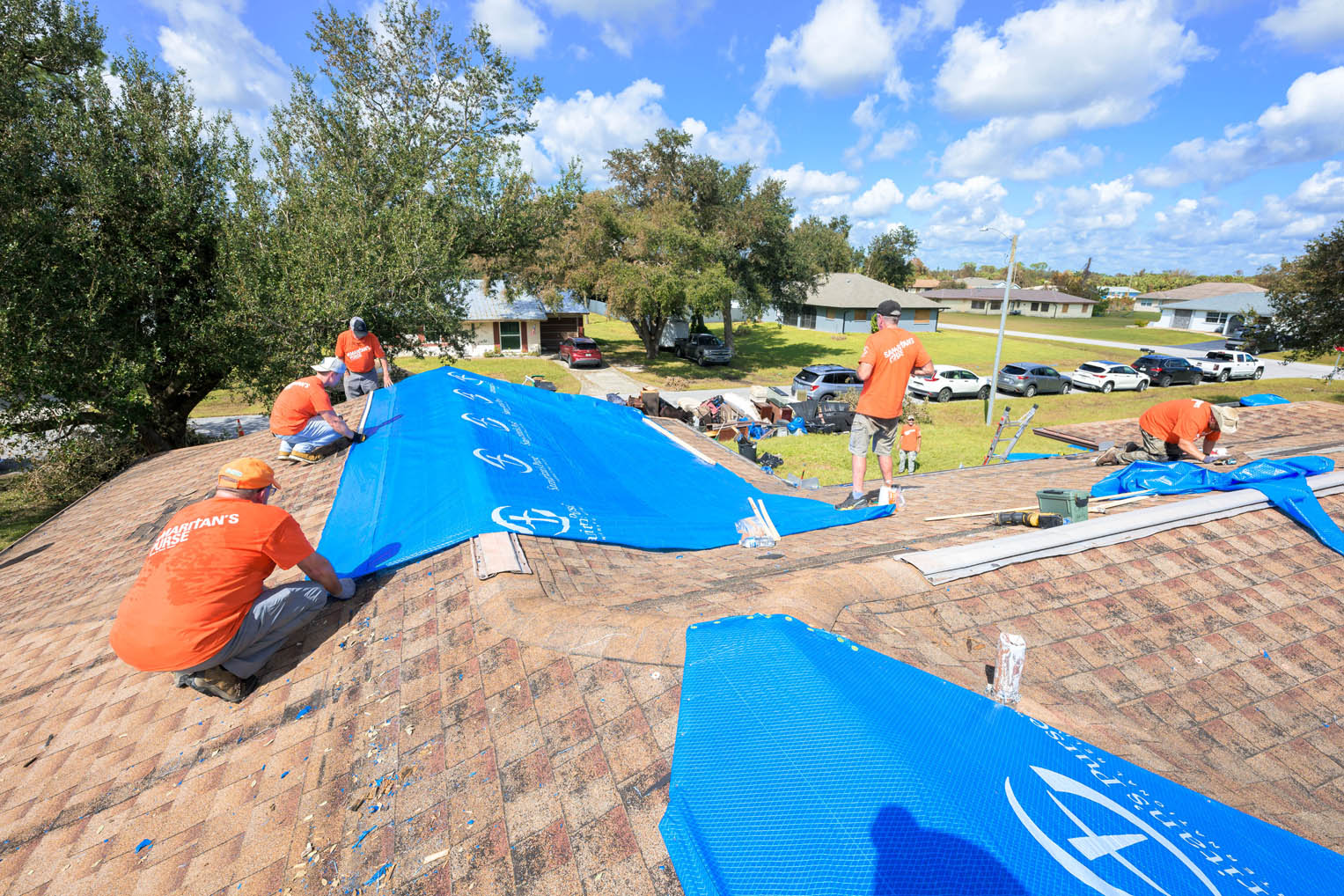 Our team tarped her roof, which was ripped up allowing water in after multiple hurricanes.