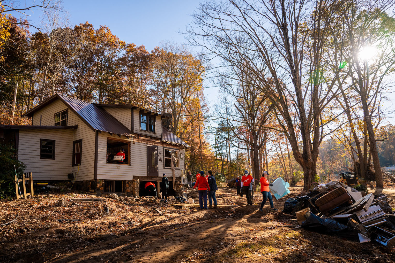 The river found channels through their home, first ripping off the porch then punching through side windows and walls.