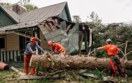 Volunteers are cutting up trees in Buncombe County, which was devastated by Hurricane Helene.