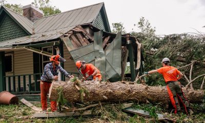 Volunteers are cutting up trees in Buncombe County, which was devastated by Hurricane Helene.