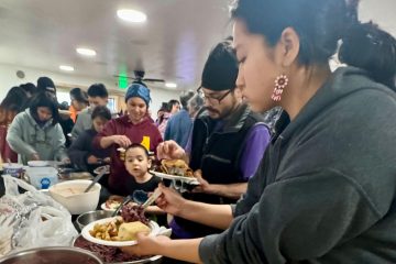 The new church was packed for the dedication service and community meal.