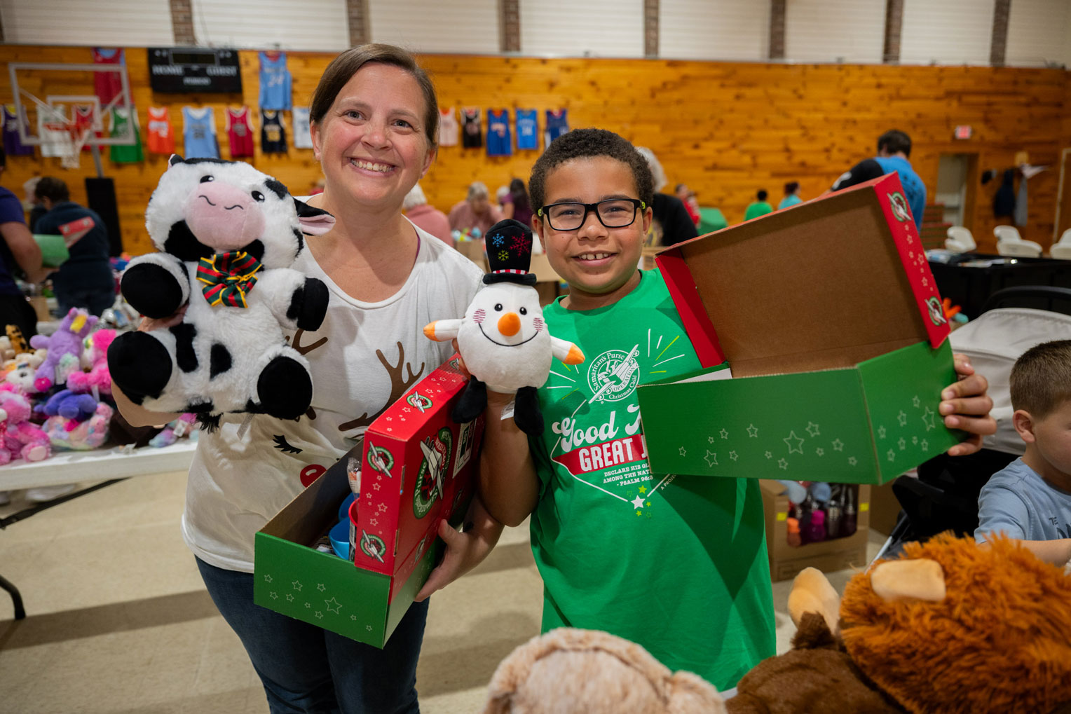 Brandi Powers, Lisa's daughter, loves to help pack shoeboxes every year.