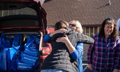 One resident expressed gratitude as she receives Thanksgiving meals from Samaritan's Purse.