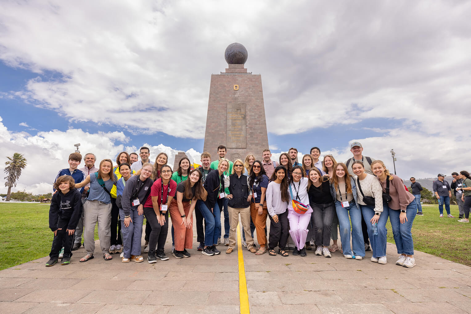 Van Susteren, center, and the Wheaton College students stood directly on the Equator during their time in Ecuador.