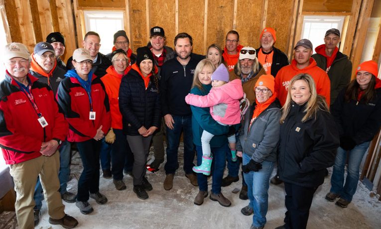 Vice President-Elect JD Vance gathers with volunteers and chaplains.