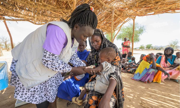 Donation item photo Sudan emergency relief. Samaritan's Purse staffer at Sudan IDP clinic.