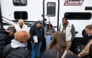 The Rays pray with our staff as we dedicate a camper to the Yancey County family.