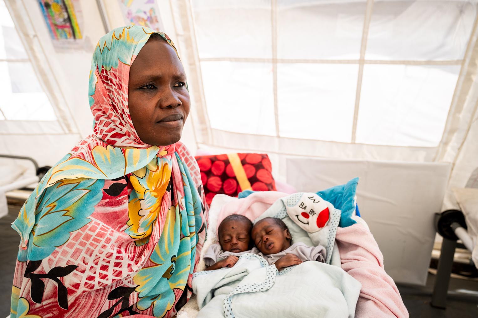 Though she grieves the loss of a child, she is grateful to God and to our team that the two surviving twins are thriving after care at our hospital.