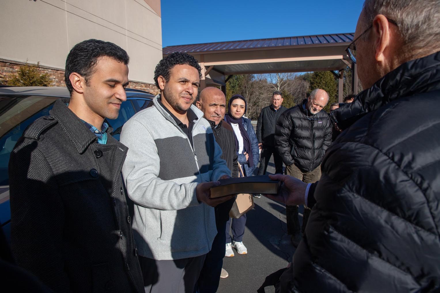 Our team presented the family with a Billy Graham Study Bible.