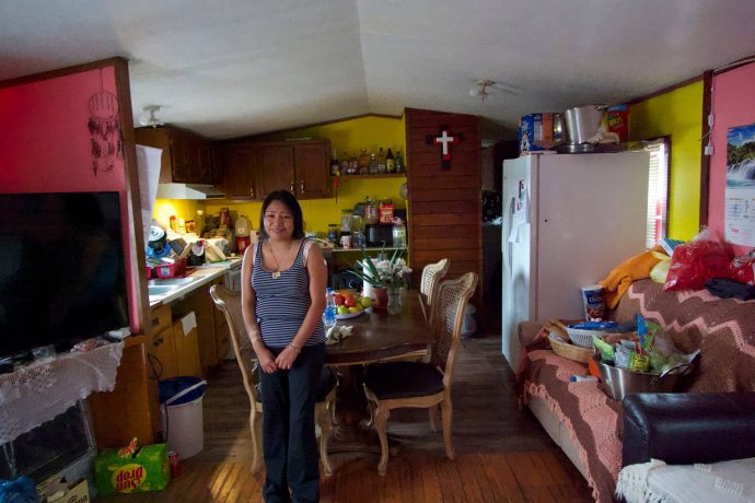 Maria Sixtos' home was not severely damaged by the hurricane, but the storm brought chaos for the family in different ways.  