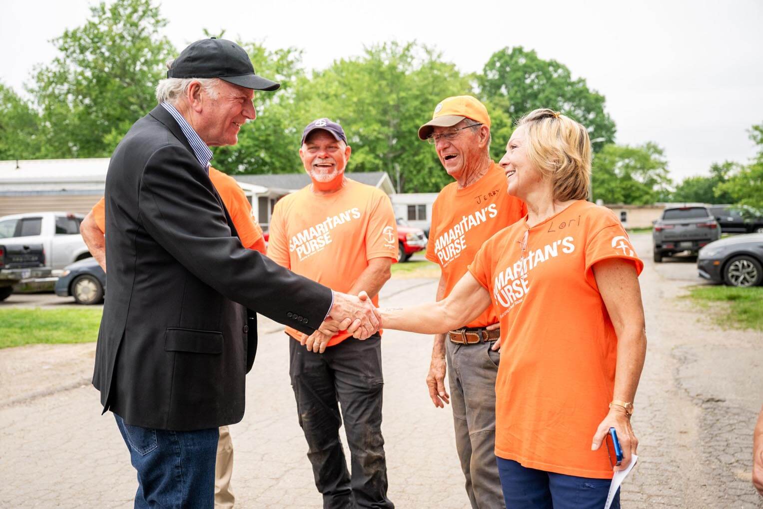 Franklin Graham greets Samaritan's Purse volunteers.