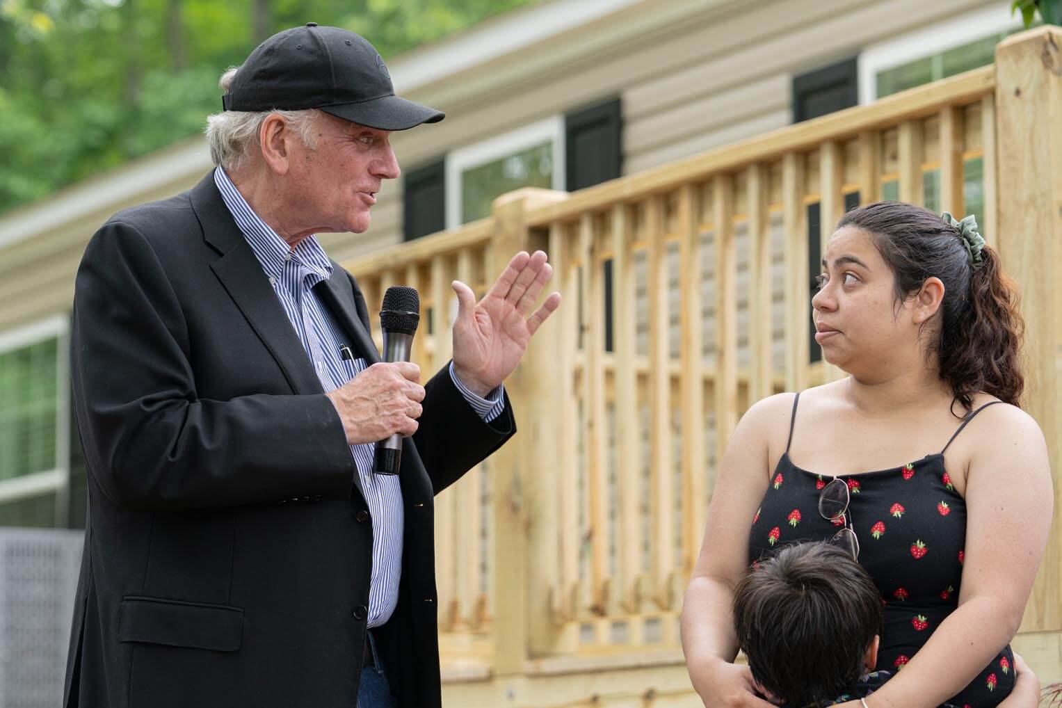 Franklin Graham speaks to Karina Ramos during the dedication ceremony.