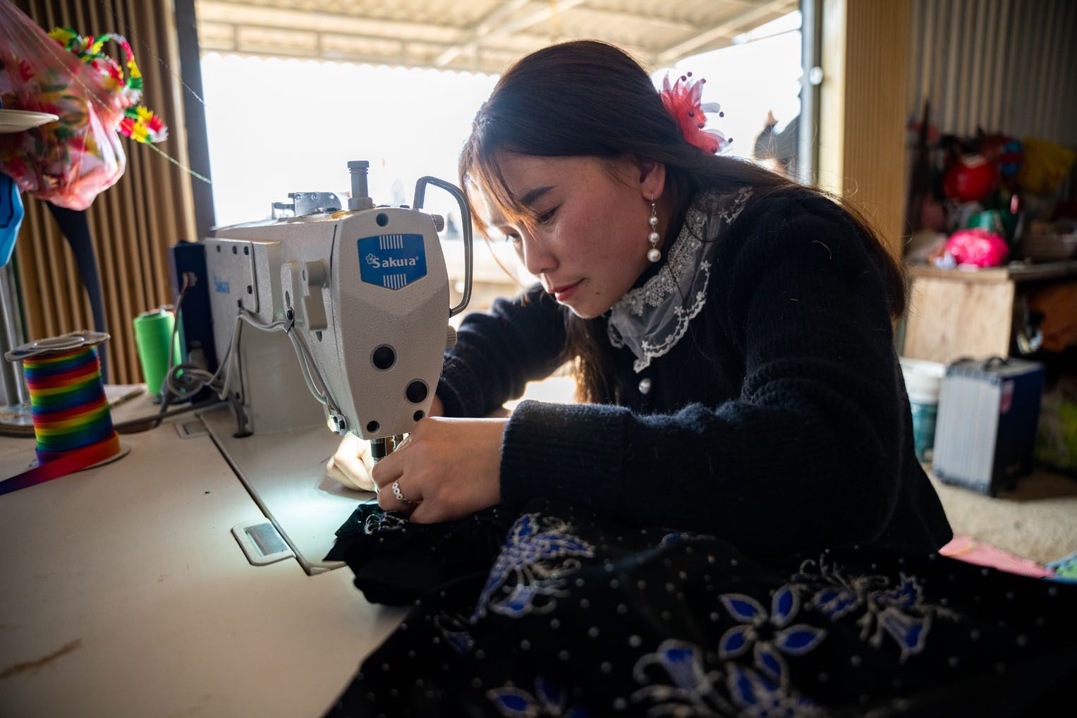 Hai opened a tailor shop with the support from Samaritan's Purse—a lifelong dream for the young mother.