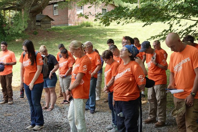 volunteers praying