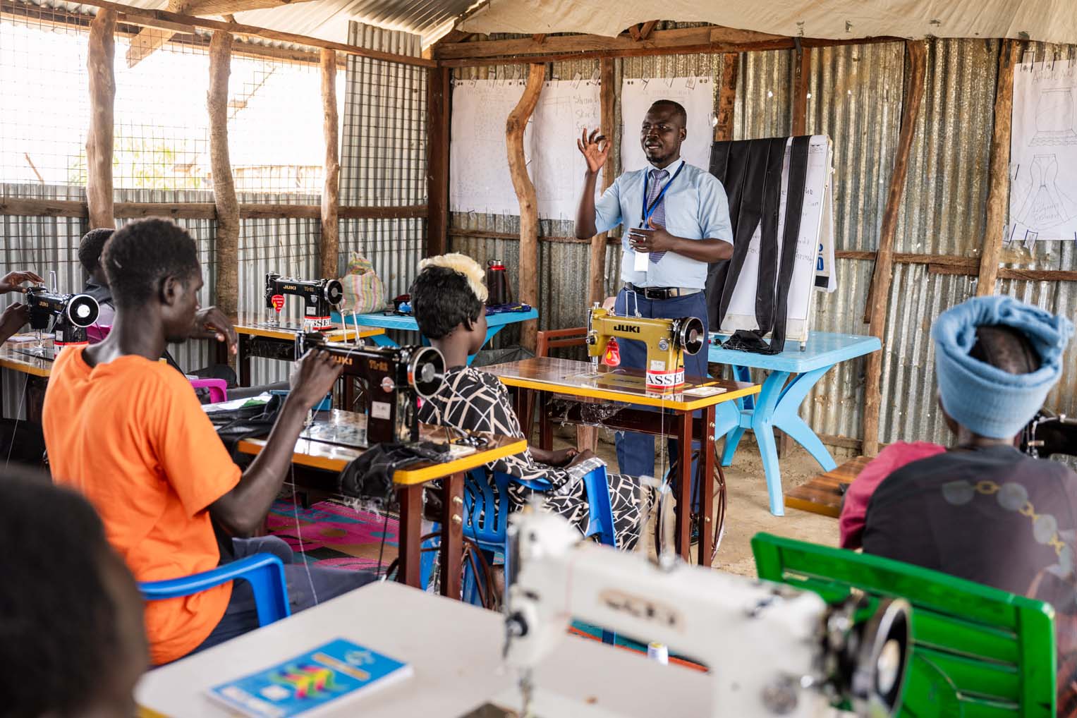 Instruction in Timothy's tailoring class is also paired with Biblical instruction on conflict management and the real foundation for peace--the lordship of Jesus Christ in people's hearts.