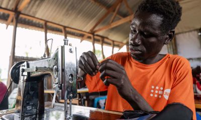 Timothy is eager to return to his village as a tailor. This new trade skill allows him to settle his family and represents a movement toward a foundation of peace in his country.