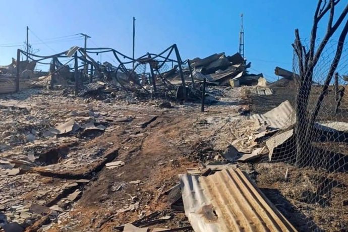 charred remains of home in Chile