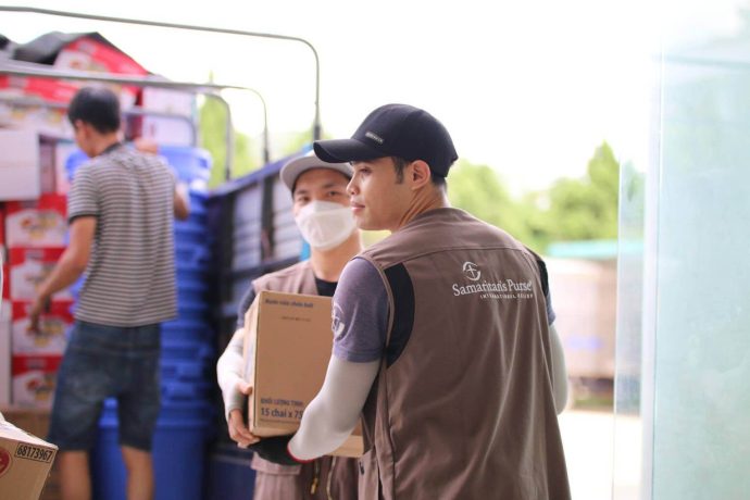 Samaritan's Purse staff unloads relief kits to distribute to hurting families in Vietnam.