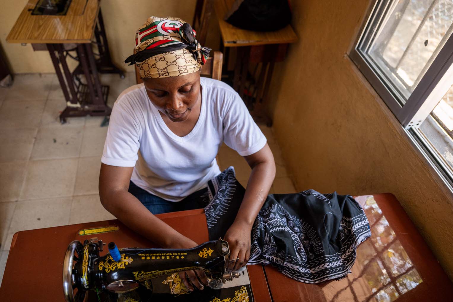 When Rina is released, she'll have a skill set to help provide a living because of her time in our livelihoods tailoring classes.