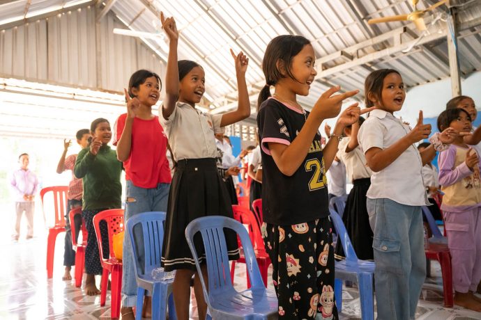 Phirun praises God during a class of The Greatest Journey