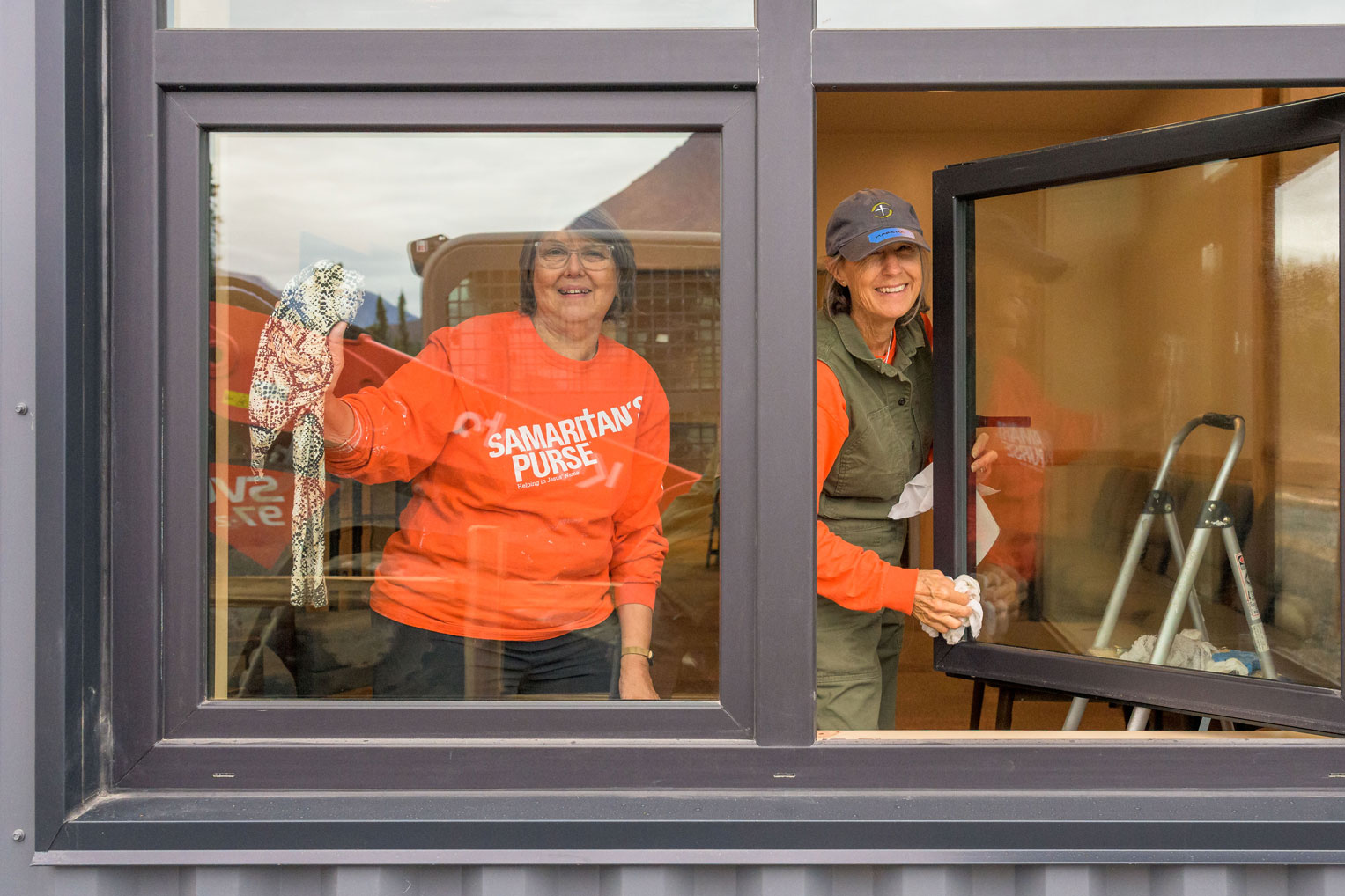 Volunteers prayerfully completed the finishing touches in the days leading up to the celebration.