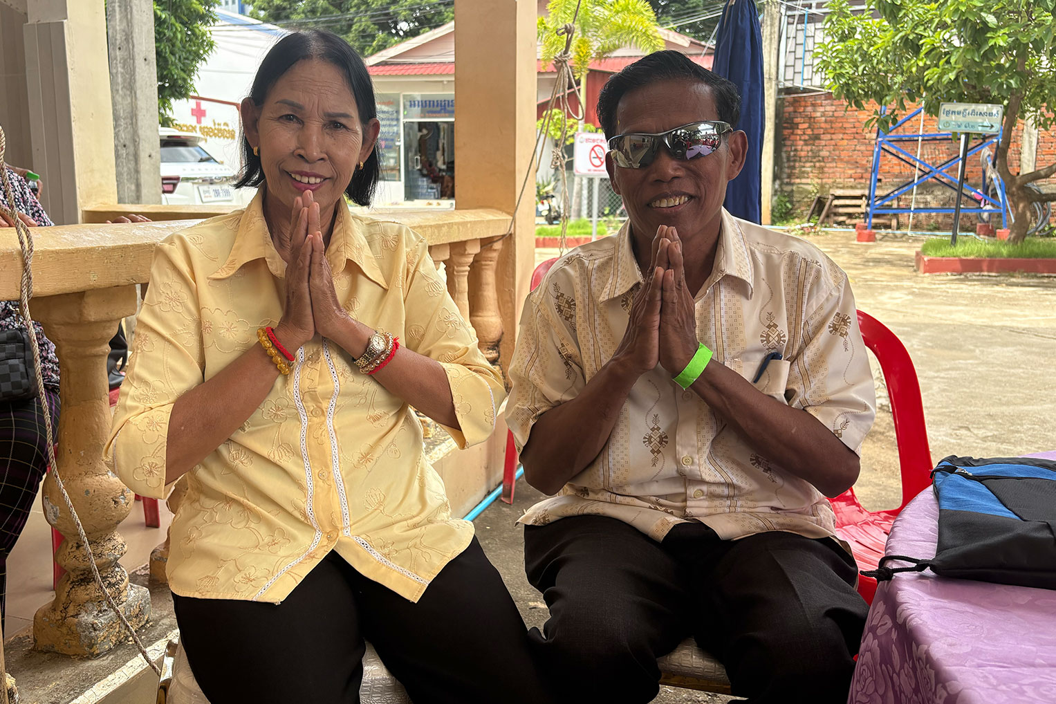 Seom, right, joins his wife in sharing gratitude for his restored eyes and the transformation of his life through a relationship with Jesus Christ.